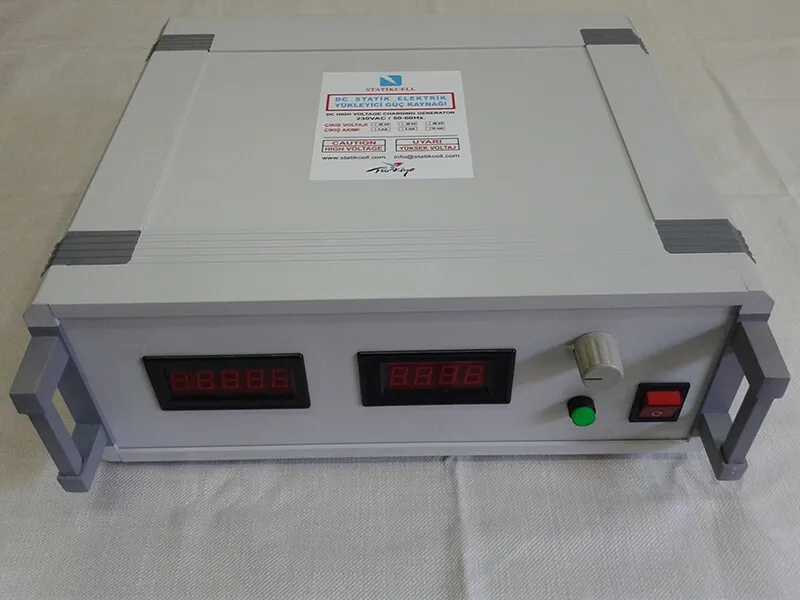 Front view of the Statikcell DC static charging power supply: digital displays, adjustment knob and on/off switch