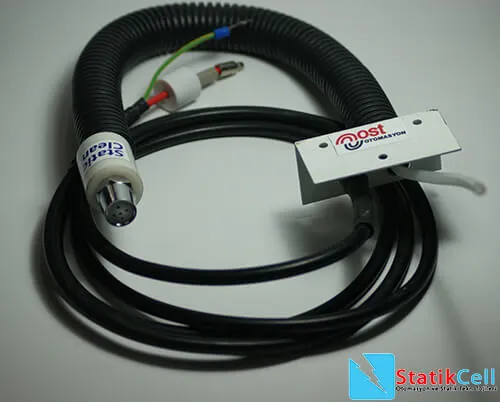 Antistatic nozzle with mounting bracket, cable in a spiral protective hose and high-voltage connector